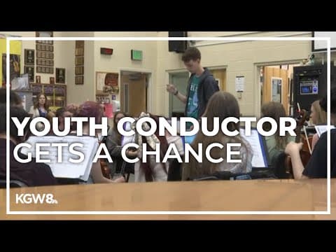 Grants Pass High School senior conducting at Newport concert