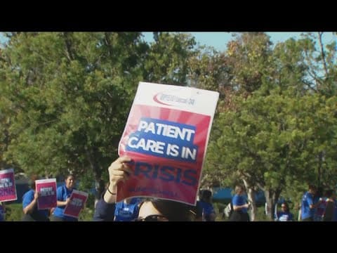 Kaiser employees striking outside La Mesa facility