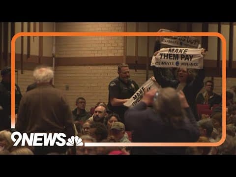 Tensions rise at Senator Bennet's town hall in Golden