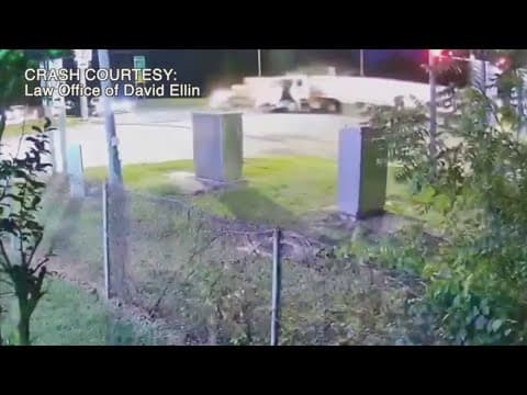 Surveillance footage shows crash between ambulance and tanker truck