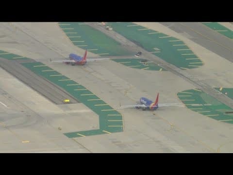 Travelers in San Diego sound off after Southwest Airlines grounds all flights nationwide