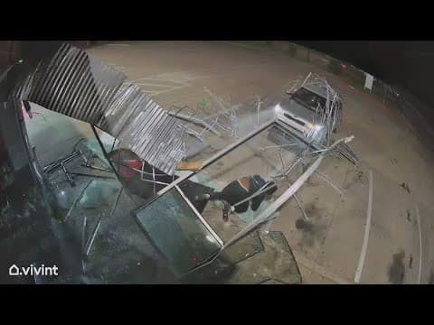 Security video shows car smash through storefront of a gunshop in North Texas