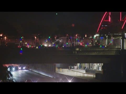 Mid-City communities kick off holidays with bridge lighting ceremony