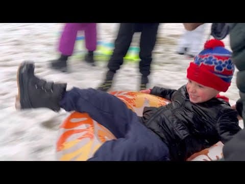 Kids enjoyed sledding in Flag Pole Hill Park in Dallas