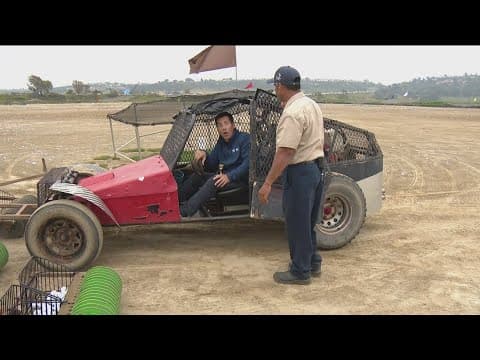 Eric trades places with a golf picker cart driver!
