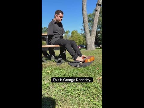 George Dennehy plays guitar without arms