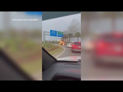 Car engulfed in flames at MSY