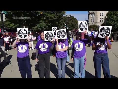 Rally outside Supreme Court as justices debate centerpiece legislation of the Civil Rights Movement