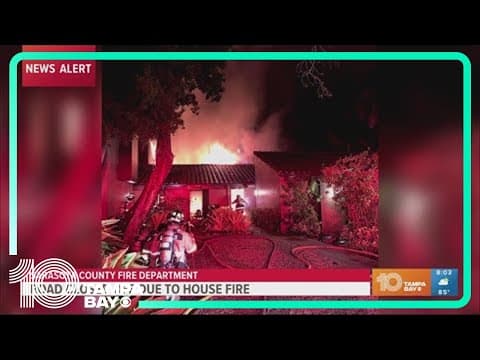 Road closed off due to house fire in Sarasota