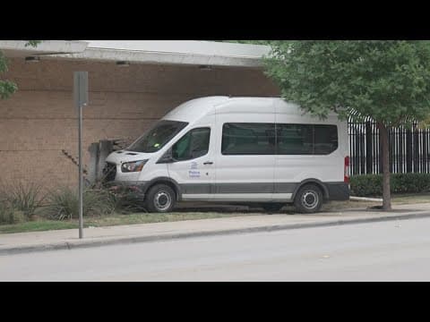 Dallas police officer crashes into headquarters building, taken to hospital, police say