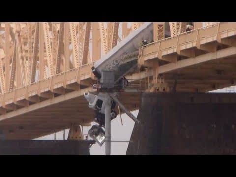 Semi driver saved from dangling truck on bridge in Louisville | Raw video