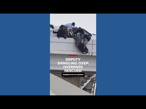 Deputy rescued after dangling from Lubbock overpass