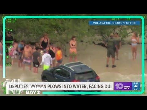 Florida woman drunk driving speeds on beach, crashes car in water