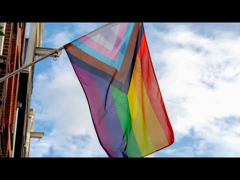 Person spotted allegedly attempting to cut Pride flag in Arlington; Arrest made