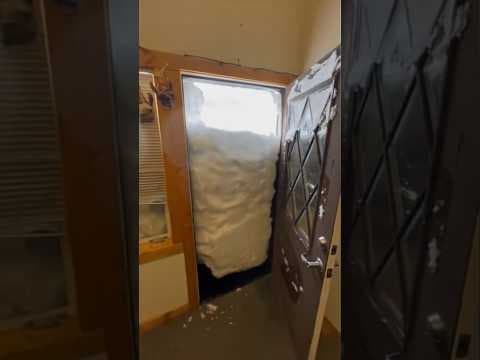 Winter storm in California | Snow piles up, completely fills doorway