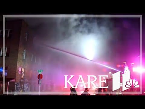 Crews forced to retreat from abandoned apartment building fire