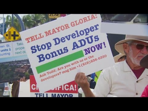 Protesters rally outside San Diego ADU developer convention