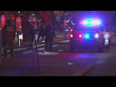 2 men hurt, police searching for 3 suspects after robbery, shooting