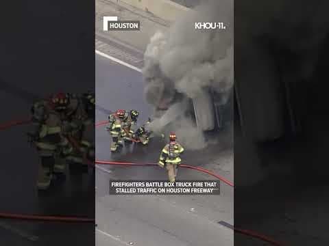 Firefighters battle box truck fire on Houston freeway