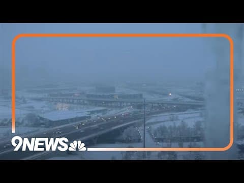 Snow falls across Denver metro area
