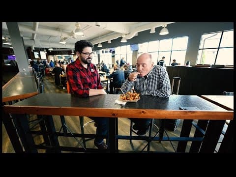 Chuck Lofton tries poutine!
