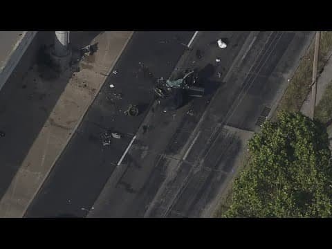 Mustang split in half in crash along Southwest Freeway feeder road