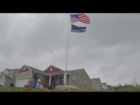 Facing fines, lawsuit, father of slain Kirkersville Police Chief takes down 'thin blue line' flag