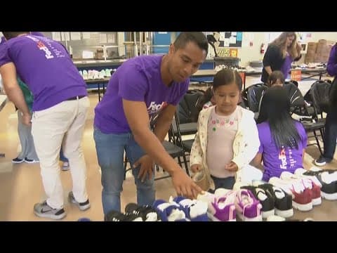 Fed-Ex donates hundreds of new shoes to South Bay elementary school