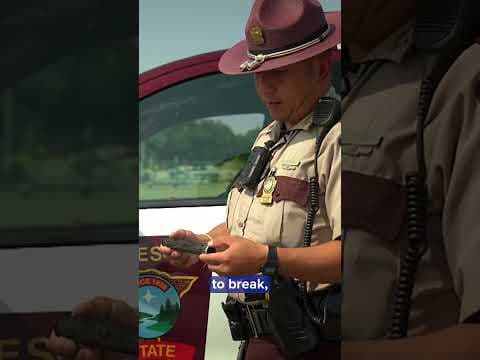 A driver is lucky to be alive after being pulled from a burning vehicle off the freeway.