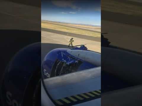 Passengers watch as Southwest plane’s engine cover rips off in takeoff