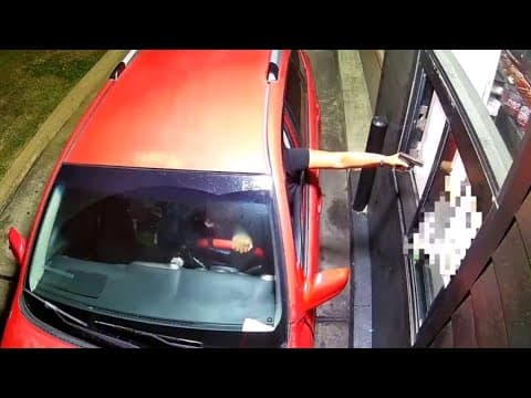 Woman seen on video pulling gun on fast-food drive-thru worker