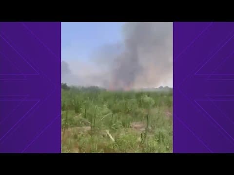 Video shows grass fire burning in Katy