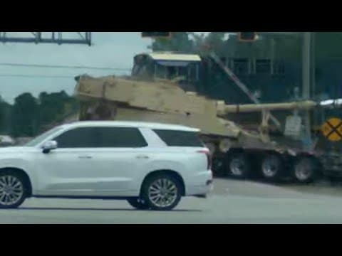 Train crashes into trailer carrying tank in South Carolina