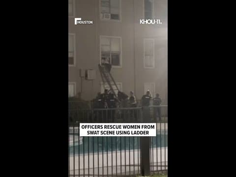 Police use ladder to help women escape during SWAT standoff