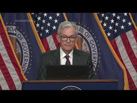 Fed hold rates steady, says job market is 'solid' while inflation 'remains somewhat elevated'