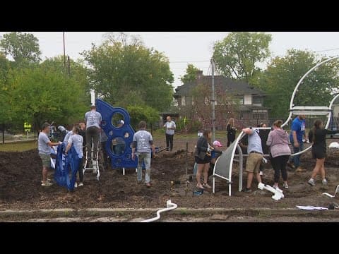 Indianapolis Colts and other volunteers surprise kids at Butler Lab School with a new playground