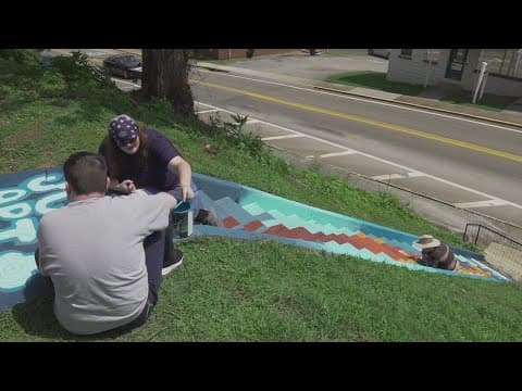 Jefferson County HS Art Club students paint mural in downtown Dandridge