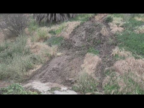 Sheared fire hydrant causes flooding and mudslide in Hillcrest in Ralphs parking lot near SR-163