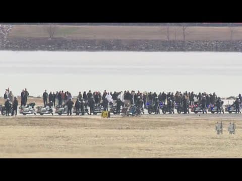 Families of DCA crash victims honor loved ones at solemn memorial