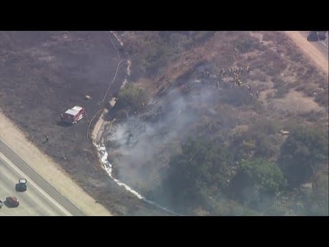 Vegetation fire burns near I-15 and Old Hwy 395 in Bonsall