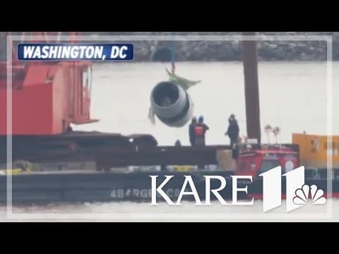 Workers attempt to lift remainder of crashed American Airlines plane from Potomac River
