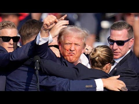 PHOTOS: Former President Donald Trump is escorted from stage after assassination attempt