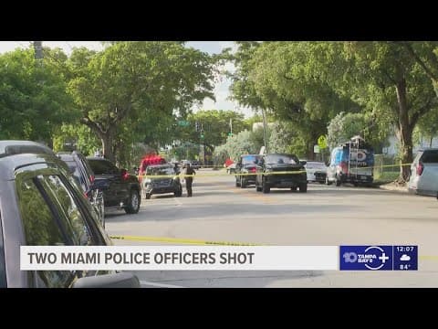 2 Florida officers shot, armed suspect contained in Miami, reports say