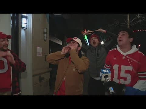 Fans celebrate Ohio State's win over Oregon in the Rose Bowl