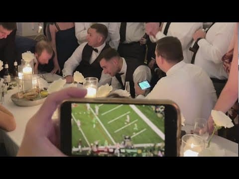 What a wedding reception looks like during the Ohio-State Notre Dame game in Buckeye Country