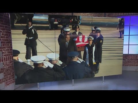 Jimmy Carter's casket makes journey to US Capitol rotunda