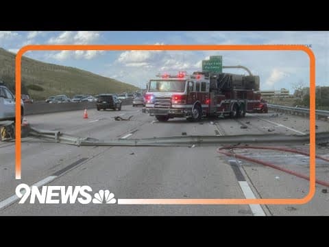 Driver killed after electric vehicle crashes into signpost, catches fire on I-25