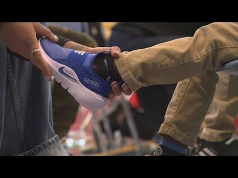 Nearly 500 students get brand new sneakers