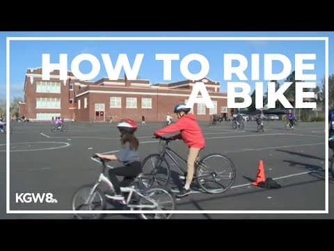 Portland elementary school students learn how to ride a bike in PE class