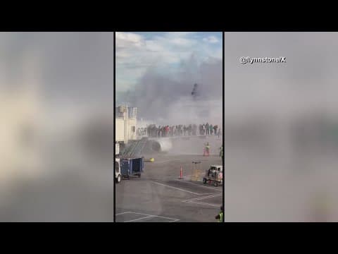 American Airlines plane catches fire